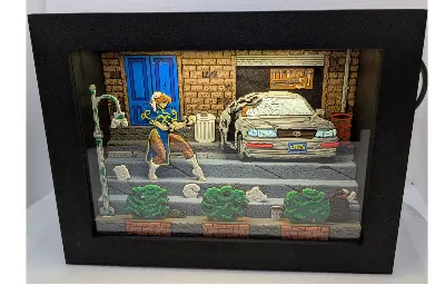 Diorama Street Fighter rétro gaming — cadre pixel art artisanal arcade 90s